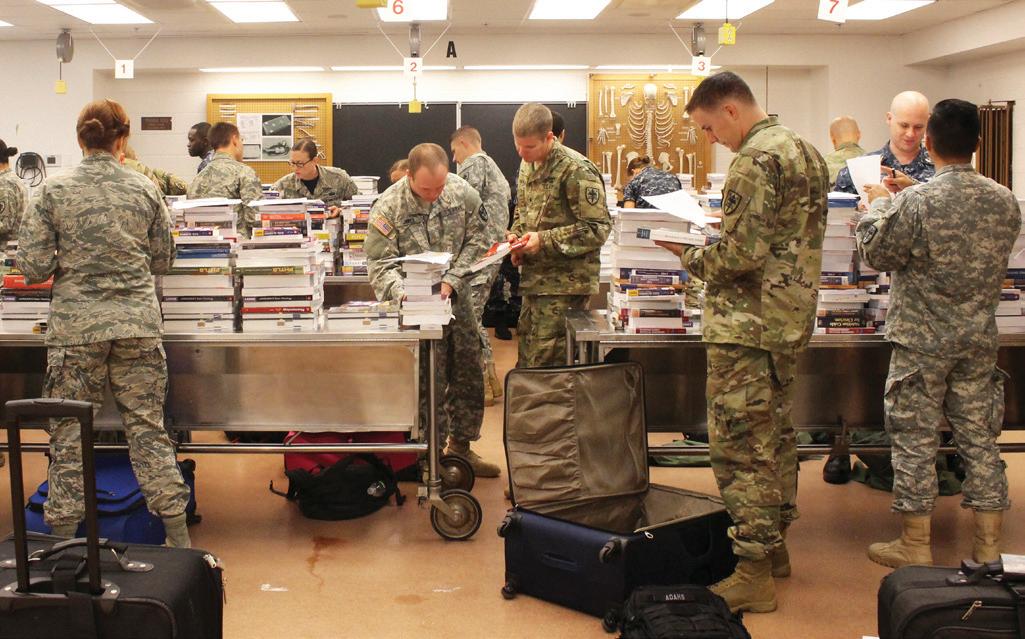 military students getting their books